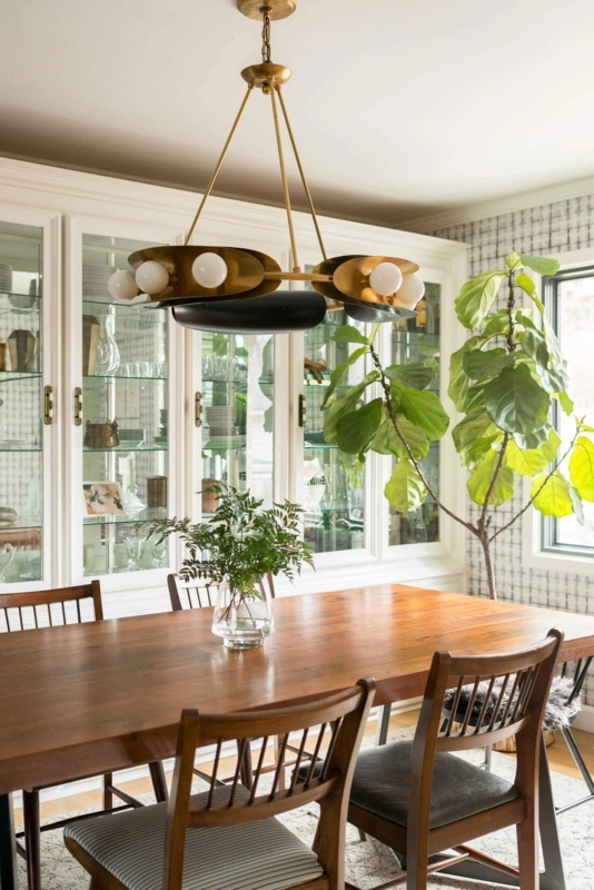 Sculptural Brass Chandelier in a mid-century modern dining room.