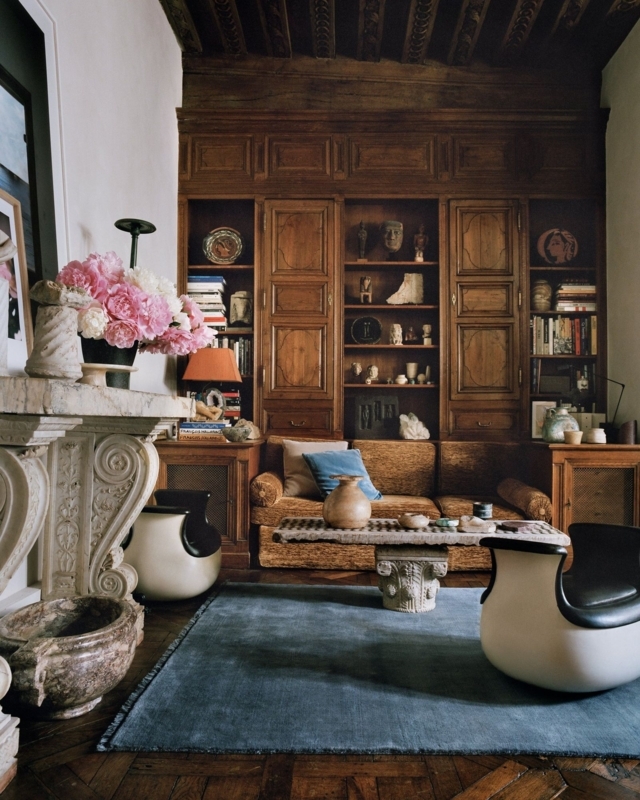 Sculptural Lounge Chairs in Collector-Style Library Living Room