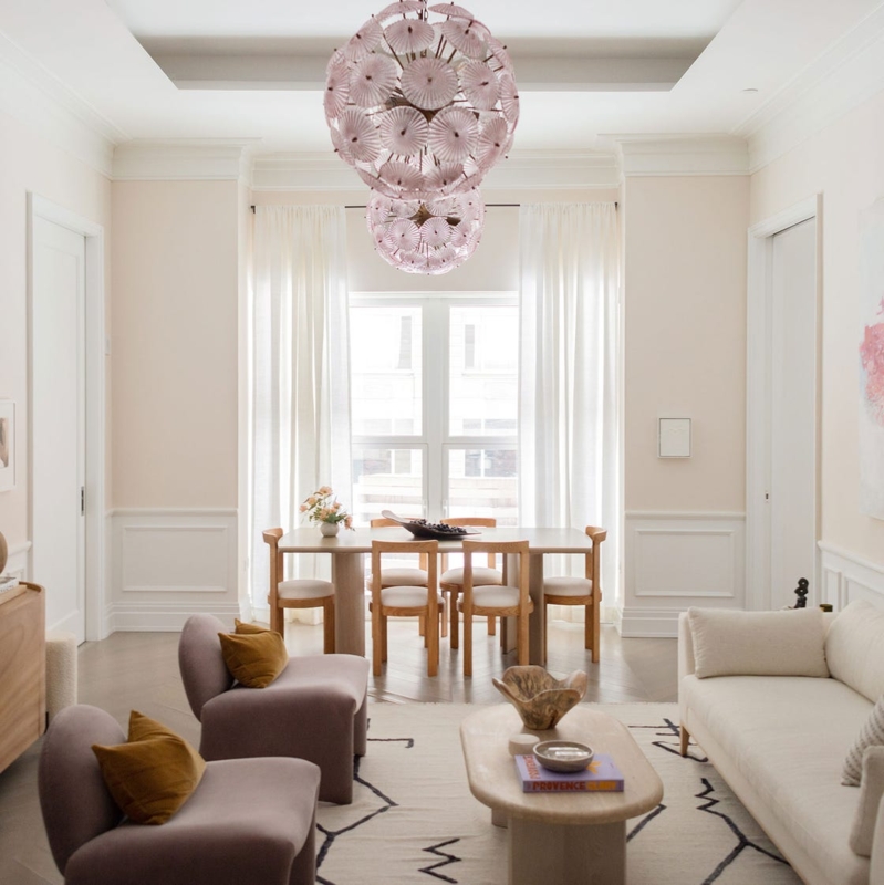 Sculptural Pink Pendants in a Serene Blush Dining Room
