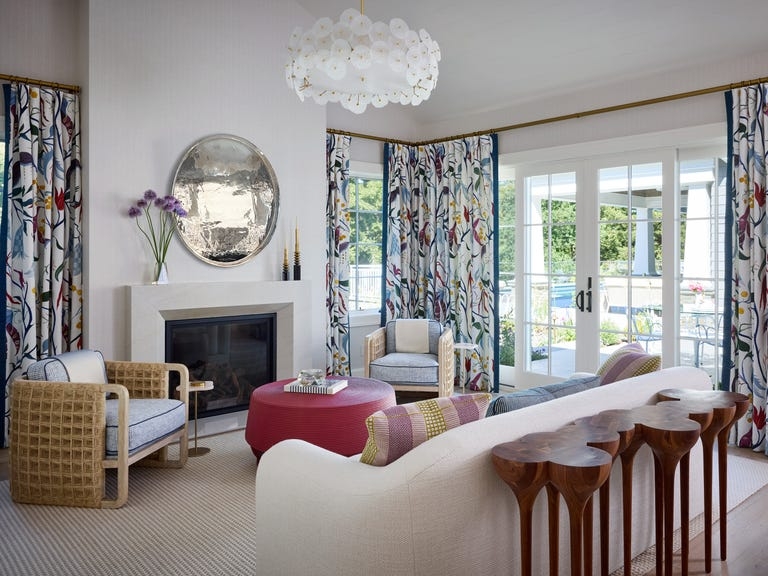 Sculptural Wood Console Behind Sofa in Bright Transitional Living Room