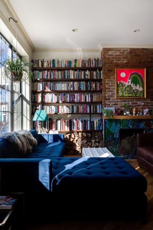 Sectional Sofa Navy Velvet Tufted Exposed Brick Library Wall