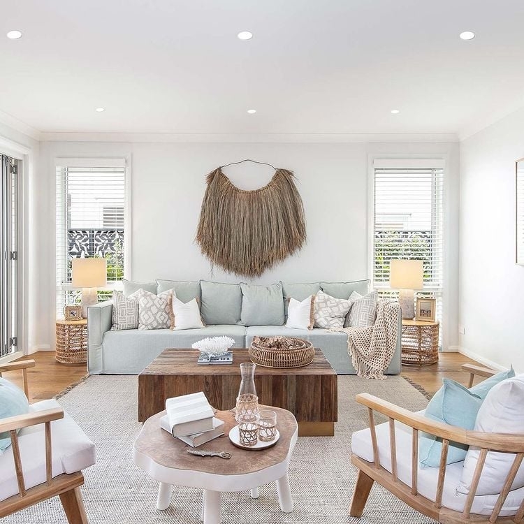 Serene Coastal Living Room Fiber Wall Art & Layered Coffee Tables