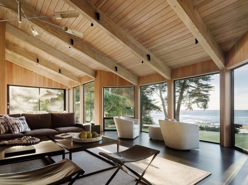 Serene Living Room: Wood Paneled Ceiling, Beams & Ocean View