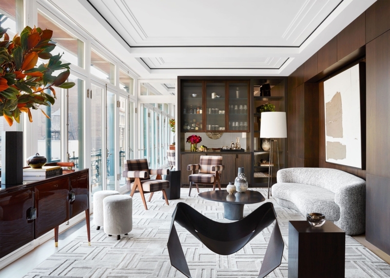 Sophisticated Loft Dark Wood Paneling Curved Sofa Layout