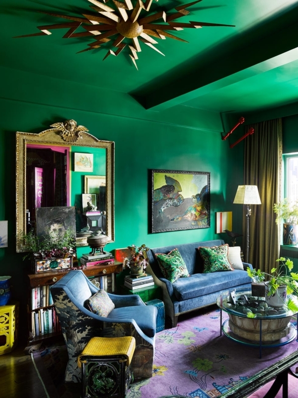 Studio Living Room with Starburst Ceiling Decor and Emerald Green Walls