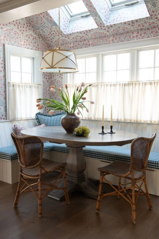 Sunlit Breakfast Nook: Floral Wallpaper Ceiling & Skylights