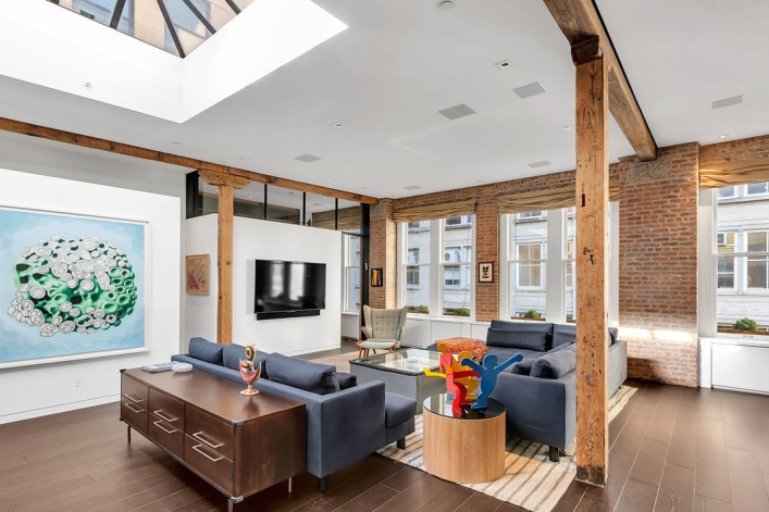 Sunlit Industrial Loft Overhead Skylight Exposed Timber Columns