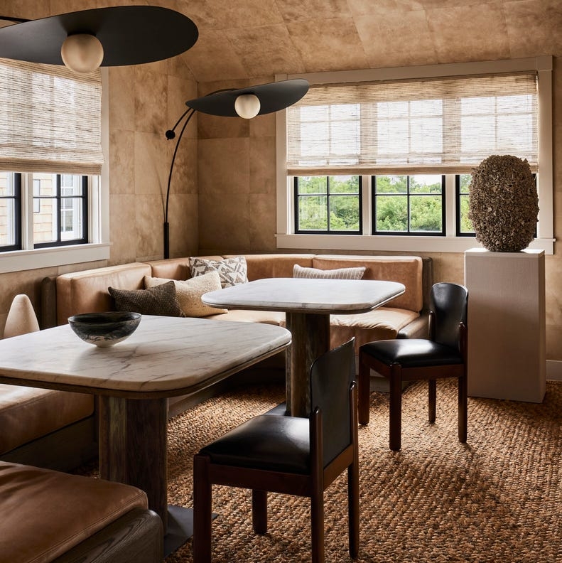 Tan Leather Banquette Seating Idea With Earthy Textured Wall Tiles