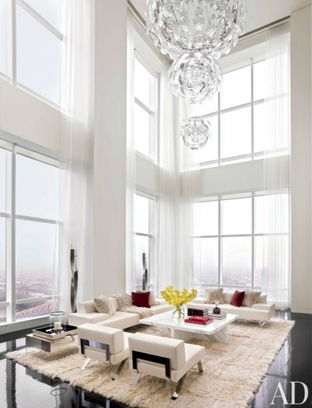 Tiered Glass Globe Chandeliers and Shaggy Cream Rug in Luxury Lounge