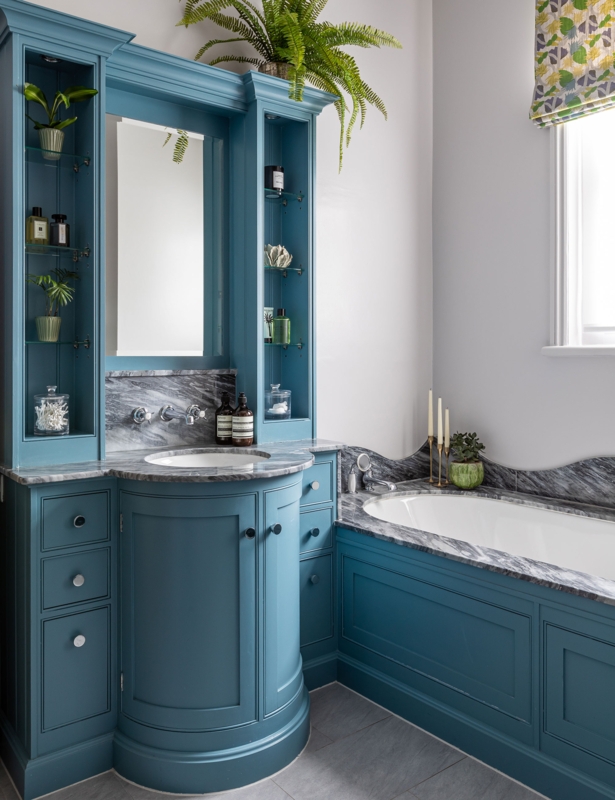 Traditional Bathroom with Curved Teal Blue Vanity, Marble Surround and Shelving