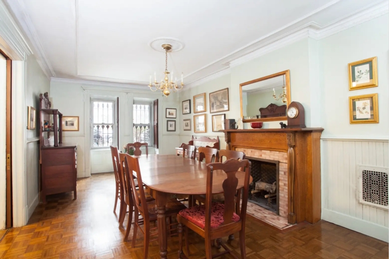 Traditional Dining Room With Sage Green Walls And Beadboard Wainscoting
