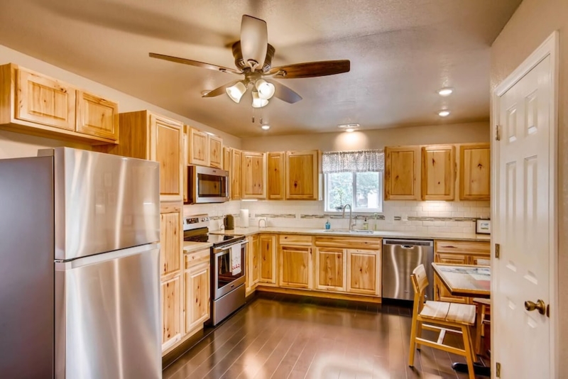 Traditional Kitchen with Honey Toned Wood Cabinetry