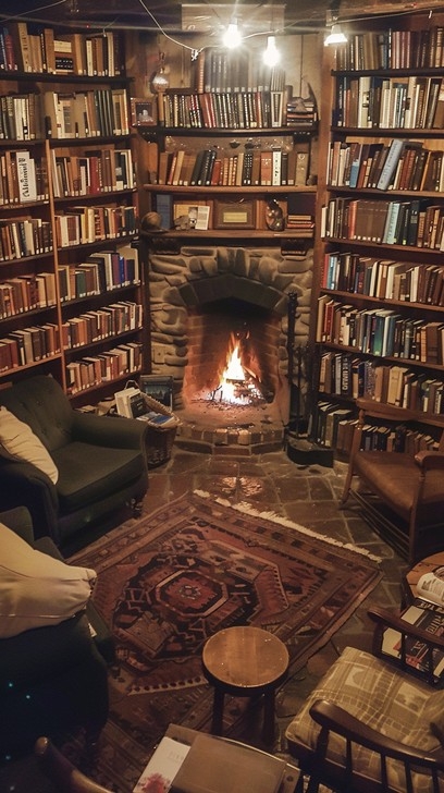 Traditional Library Nook: Wall-to-Wall Books & Stone Fireplace.
