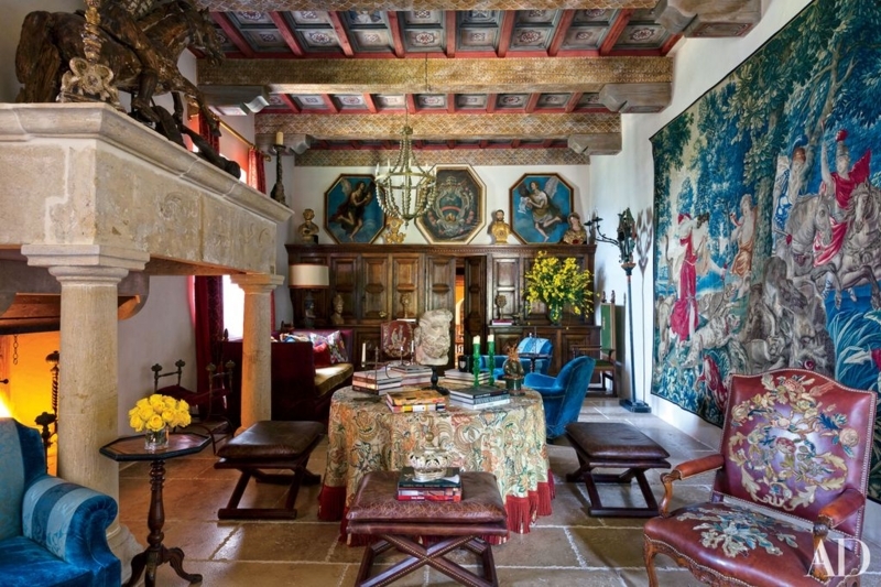 Traditional Living Room with Scenic Tapestry & Stone Fireplace