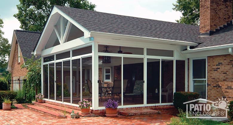 Traditional White Screened Porch with Gabled Roof & Brick Foundation.