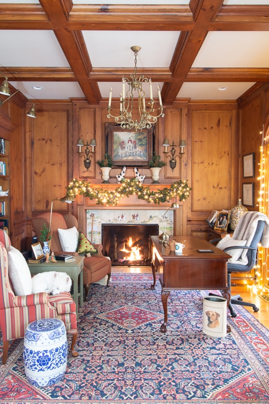 Traditional Wood Paneled Study with Fireplace and Oriental Rug