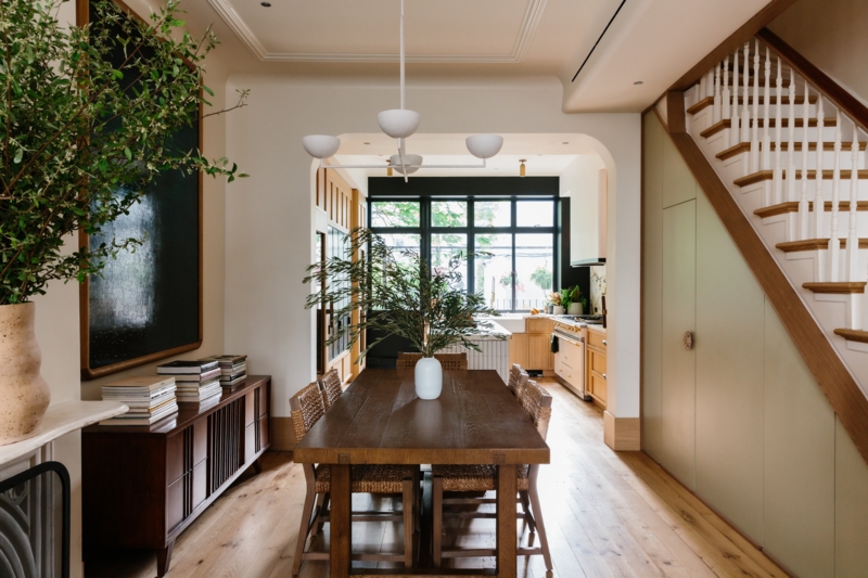 Transitional Dining Room with Archway and Woven Seating