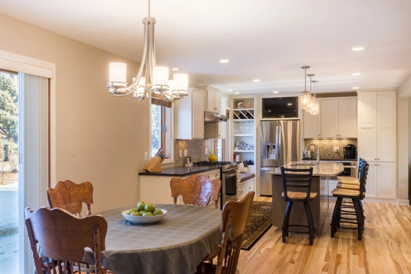 Transitional Kitchen Dining: White Shaker Cabinets & Classic Chandelier
