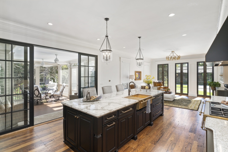 Transitional Kitchen with Black Framed Glass Doors & Brass Apron Sink