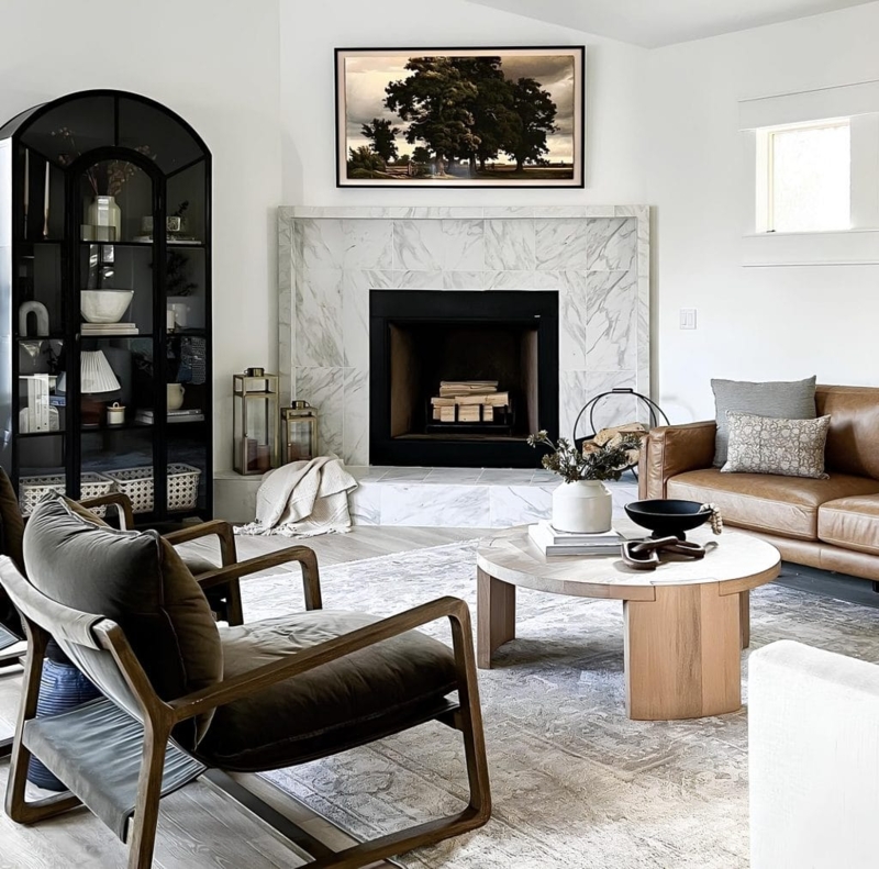 Transitional Living Room with Arched Display Cabinet & Marble Fireplace