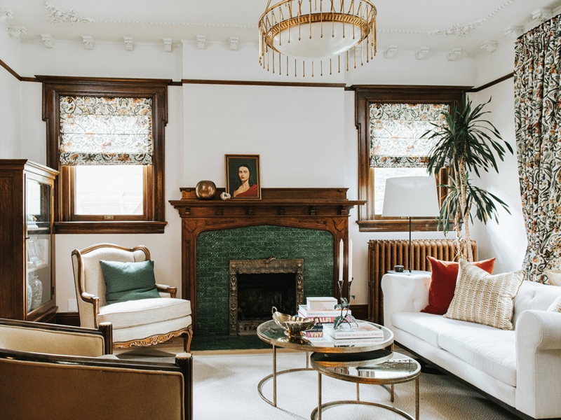 Transitional Living Room with Green Tile Fireplace & Floral Roman Shades
