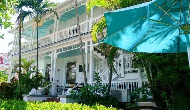 Tropical Guest House Teal Patio Umbrella Light Blue Ceiling