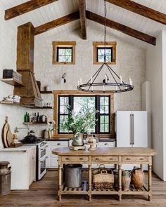 Vaulted Ceiling Kitchen Scene with Wood Beams & Candle Chandelier