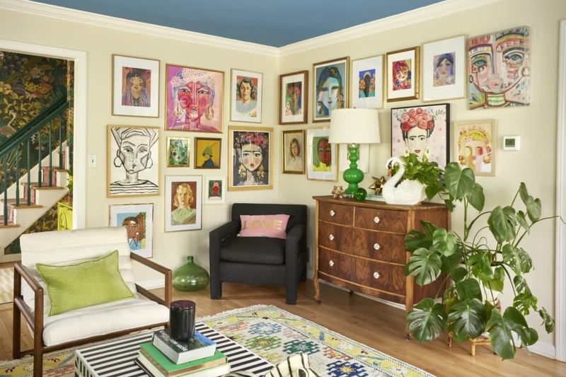 Vibrant Portrait Gallery Wall Display in Maximalist Living Room