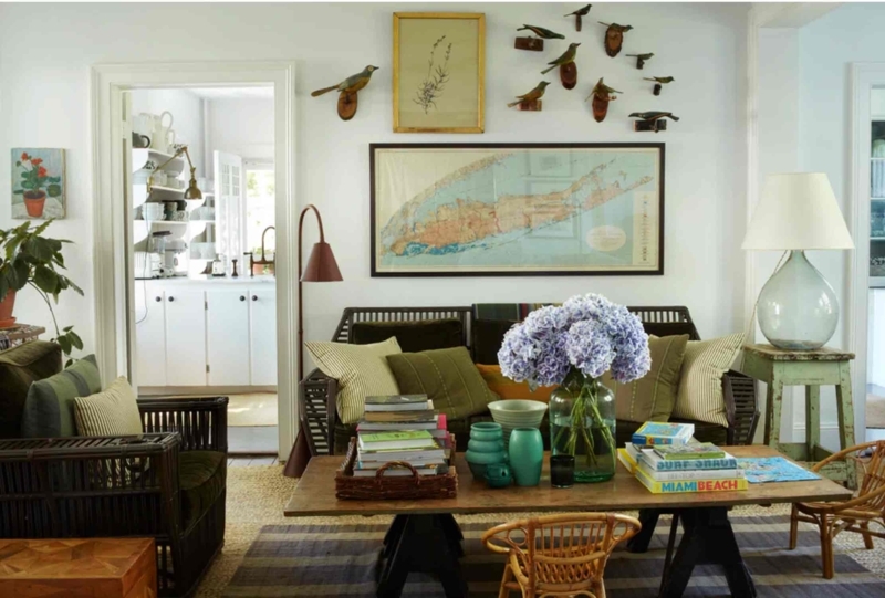 Vintage Coastal Living Room with Large Horizontal Map and Rattan Chairs
