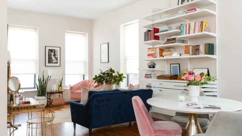 Wall-Mounted Bookcase: Modern Glam with Navy Velvet Sofa