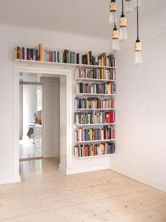 Wall-Mounted Shelving: White Minimalist Doorway Wrap Around Shelving