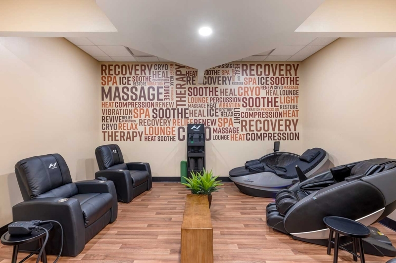 Wellness Recovery Lounge Design Featuring A Typographic Wall Mural