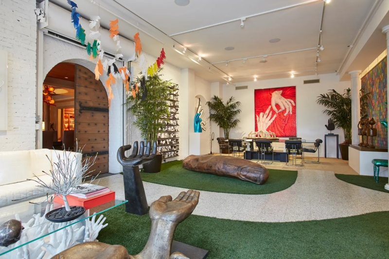 Whimsical Eclectic Loft Design: Artificial Grass Floor & Oversized Art