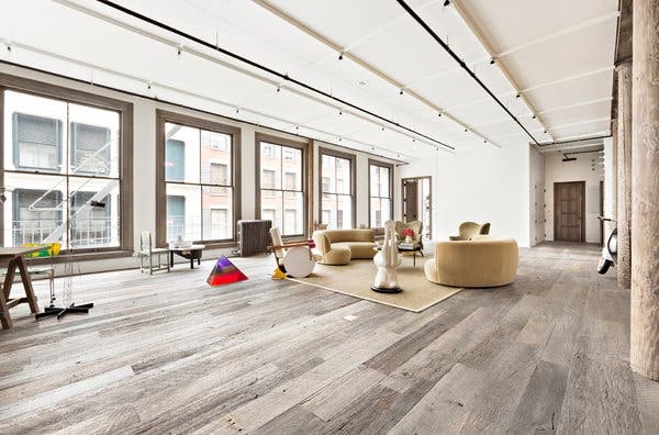 Whimsical Industrial Loft Curved Seating Wide Plank Floors