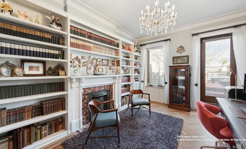 White Floor To Ceiling Bookshelves In Herringbone Hardwood Floor Office