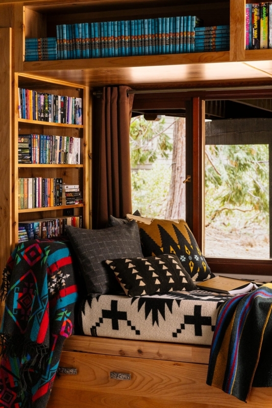 Window Seat Rustic Wood with Southwest Textiles and Built-In Shelves
