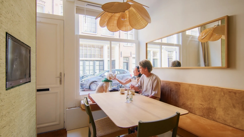 Window Side Dining Nook featuring Sculptural Petal Pendant Light