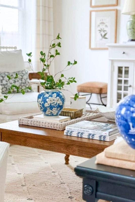 Wood Coffee Table Styling with Blue and White Vase and Tray