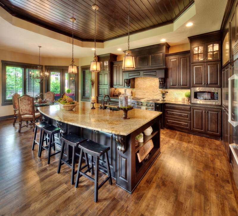 Wood Paneled Tray Ceiling: Mediterranean Kitchen with Dark Cabinets